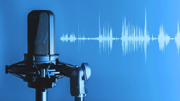 Blue graphic with podcast mic and audio waves