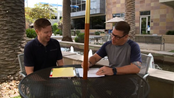 Two Veterans talking outside as part of Intuit's Veteran Mentorship Proram