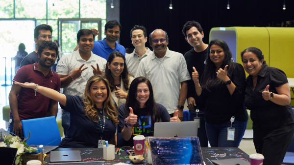 Around 10 Intuit technologists gather for a group photo