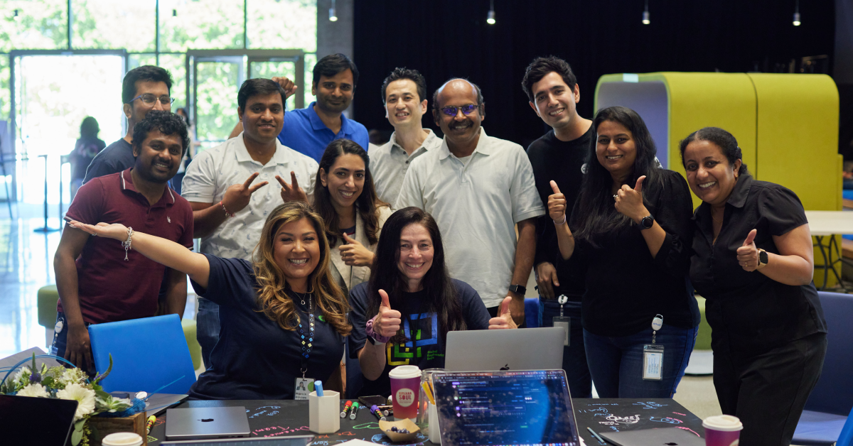 Around 10 Intuit technologists gather for a group photo